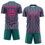 Benutzerdefiniertes blaugrün-rosa-schwarzes geometrisches Sublimations-Fußballuniformtrikot Benutzerdefiniertes blaugrün-rosa-schwarzes geometrisches Sublimations-Fußballuniformtrikot